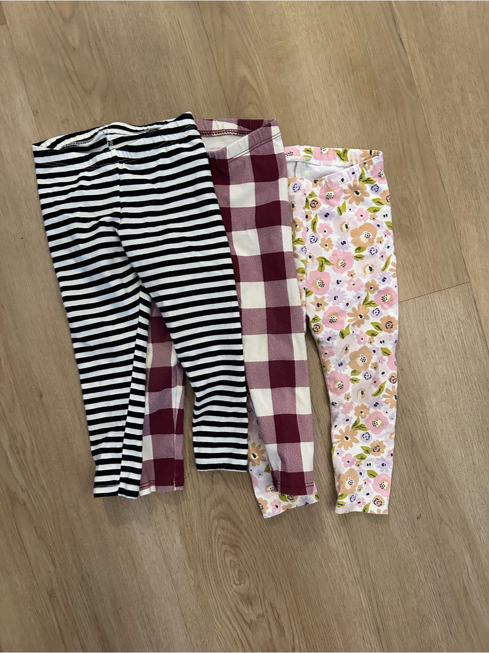 Cat & Jack Girls' 3-Pack Leggings - Black Stripe, Burgundy Plaid & Pink Floral